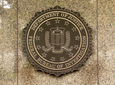 Washington, DC - June 02, 2018: FBI, Federal Bureau of Investigation seal on the Headquarters Edgar Hoover FBI Buildingin in Washington. clipart