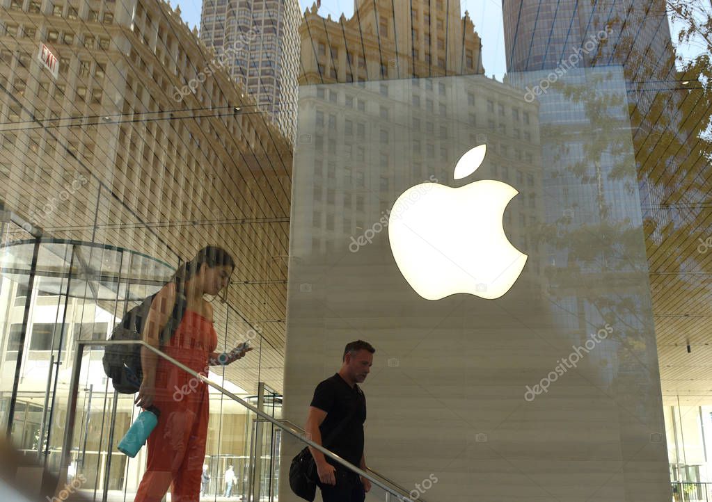 Chicago, USA - June 06, 2018: People in the Apple store on Michigan Avenue in Chicago, Illinois.