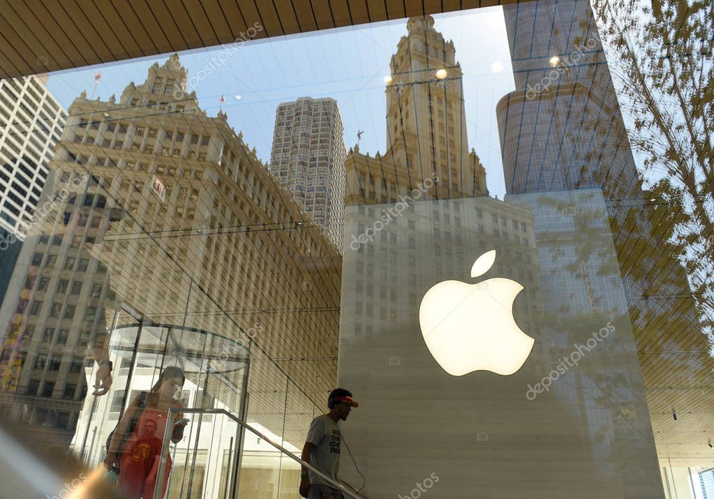 Chicago, USA - June 06, 2018: People in the Apple store on Michigan Avenue in Chicago, Illinois.