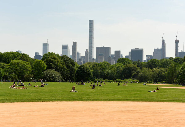 New York, USA - May 25, 2018: People in Central Park in New York.