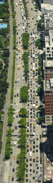 View from skyscrapers on the streets of New York City. Top view on the street with cars on the road