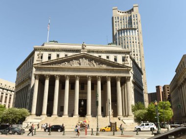 New York, USA - May 24, 2018: New York County Supreme Court and U.S. District Court - Southern District of New York at background. clipart