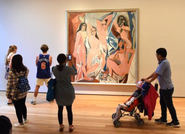 New York, USA - June 8, 2018: People near the Pablo Picasso painting 