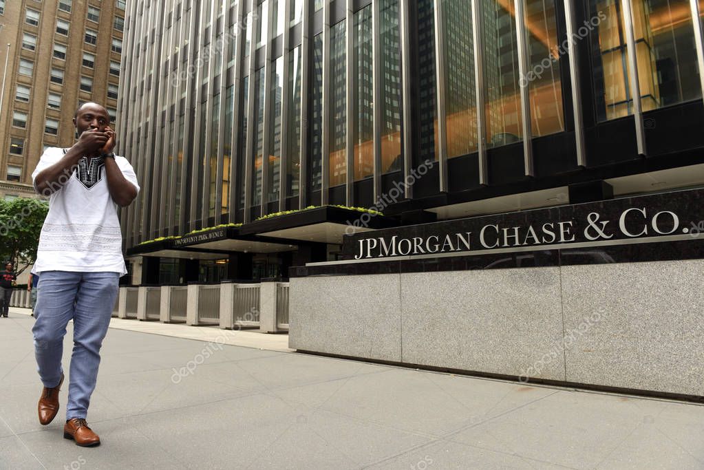 New York, USA - May 26, 2018: A man pass near JPMorgan Chase & Co office at the Park Ave in New York, NY.
