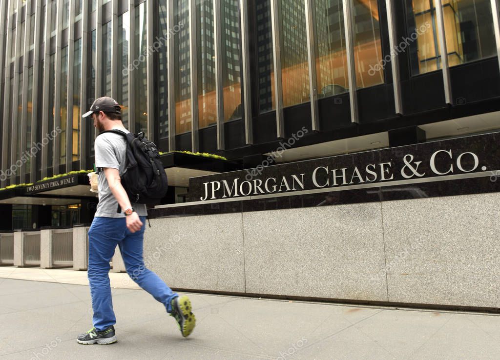 New York, USA - May 26, 2018: A man pass near JPMorgan Chase & Co office at the Park Ave in New York, NY.