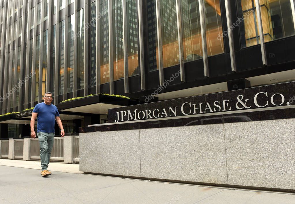 New York, USA - May 26, 2018: A man pass near JPMorgan Chase & Co office at the Park Ave in New York, NY.