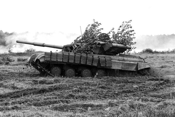 Military tank. Military concept. Tank on exercises. BW