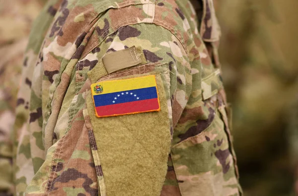 Venezuela flag on soldiers arm. Venezuela troops (collage)