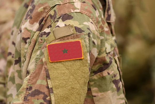 Morocco flag on soldiers arm. Morocco troops (collage)