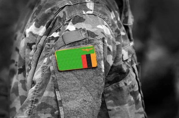 Bandiera Dello Zambia Sul Braccio Dei Soldati Collage — Foto Stock
