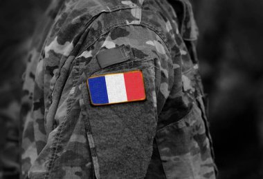 Flag of France on soldiers arm (collage). clipart