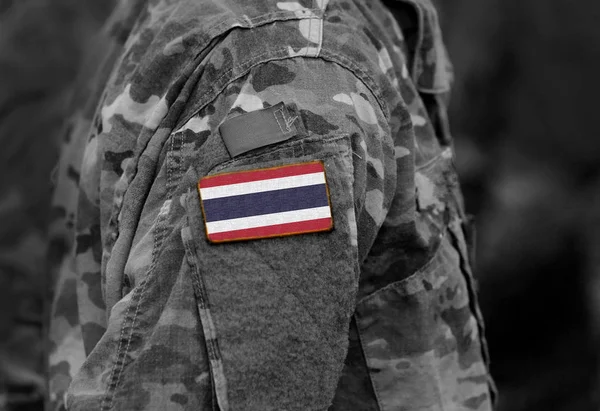 Flag of Thailand on military uniforms. Thailand flag on soldiers arm (collage).