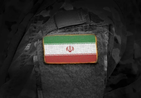 Bandera de Irán sobre uniforme militar (collage). — Foto de Stock