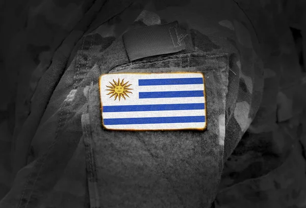 Flag of Uruguay on soldiers arm. — Stock Photo, Image