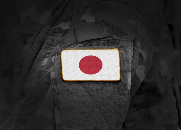 Flag of Japan on military uniform.