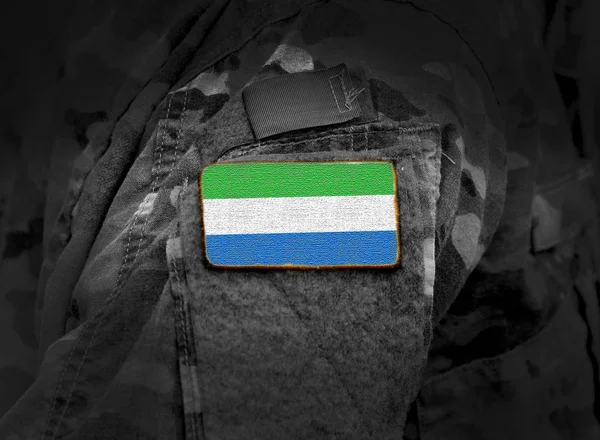 Flag of Sierra Leone on military uniform. — Stock Photo, Image