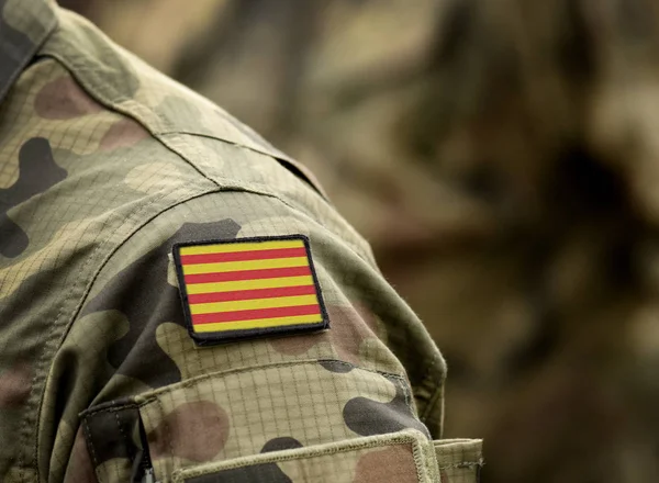 Flag of Catalonia (Senyera) on military uniform. Collage. — Stock Photo, Image