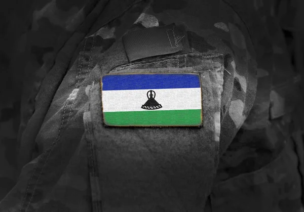Flag of Lesotho on military uniform. Army, troops, soldiers. — Stock Photo, Image