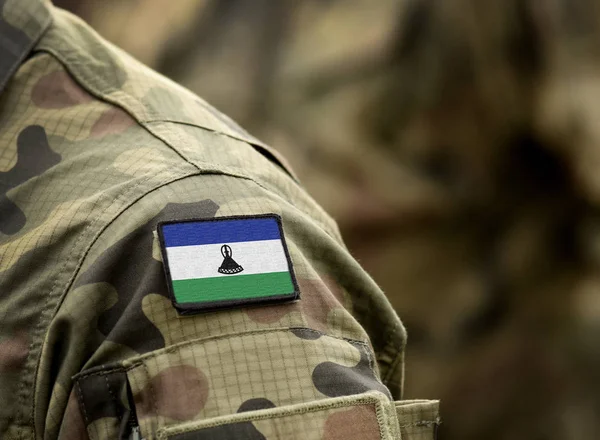 Flag of Lesotho on military uniform. Army, troops, soldiers. — стокове фото