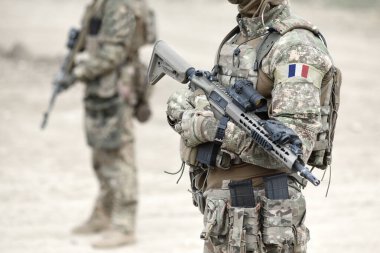 Soldiers with assault rifle and flag of France on military uniform. Collage.  clipart