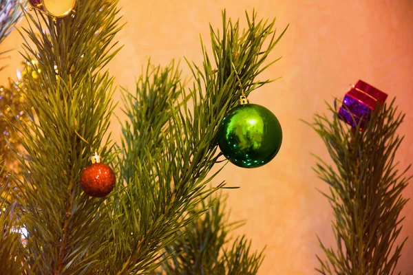 Decorated Christmas Tree closeup. Colofrul balls and garland shining — Stock Photo, Image