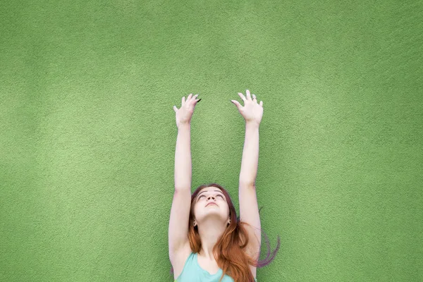 Red hair charming girl with hands up — Stock Photo, Image