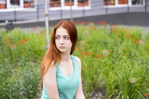 Sweet red-haired girl in mint shirt — Stock Photo, Image