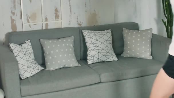 Tired woman resting on the sofa — Stock Video