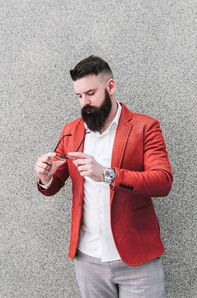 Portrait Young Handsome Man Orange Jacket Standing Gray Wall Background — Stock Photo, Image