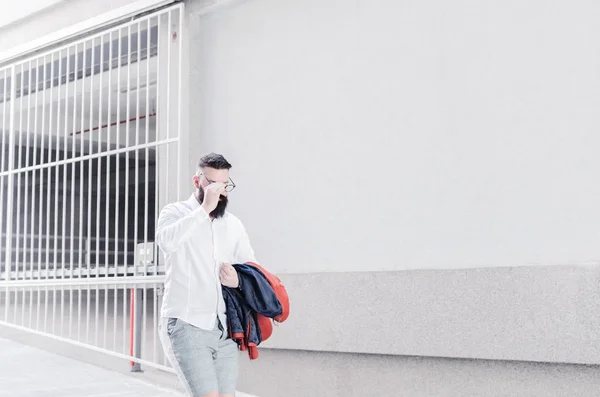 Business man walking on walk way in car park of airport parking lot. natural light effect