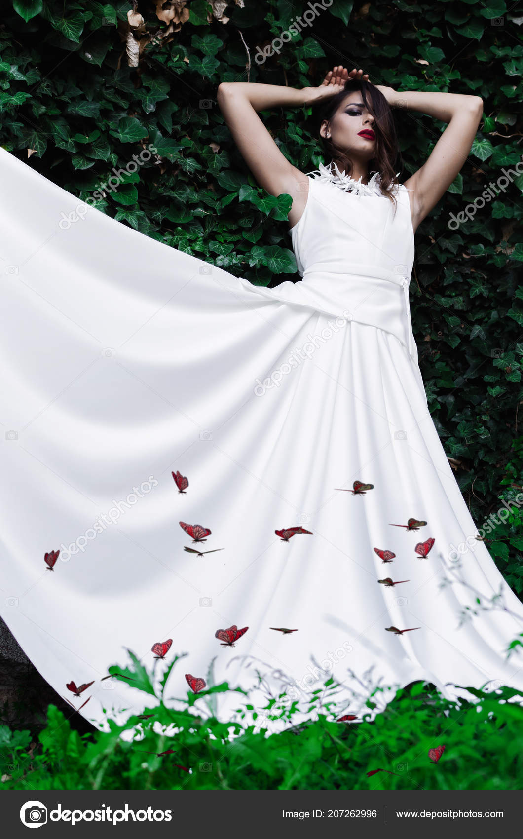 A Woman in Long Dress Posing for a Photoshoot · Free Stock Photo