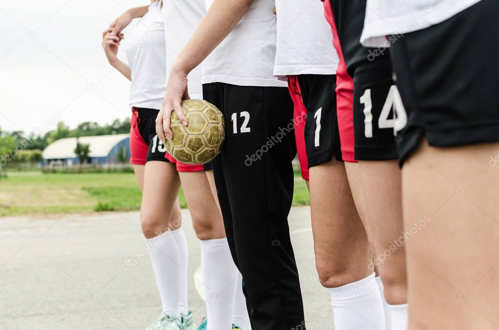 Close up of young female players of handball outdoors