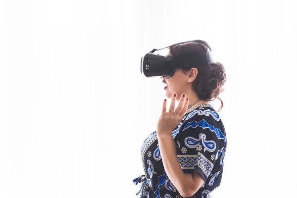 Indian woman using wearable virtual reality headset