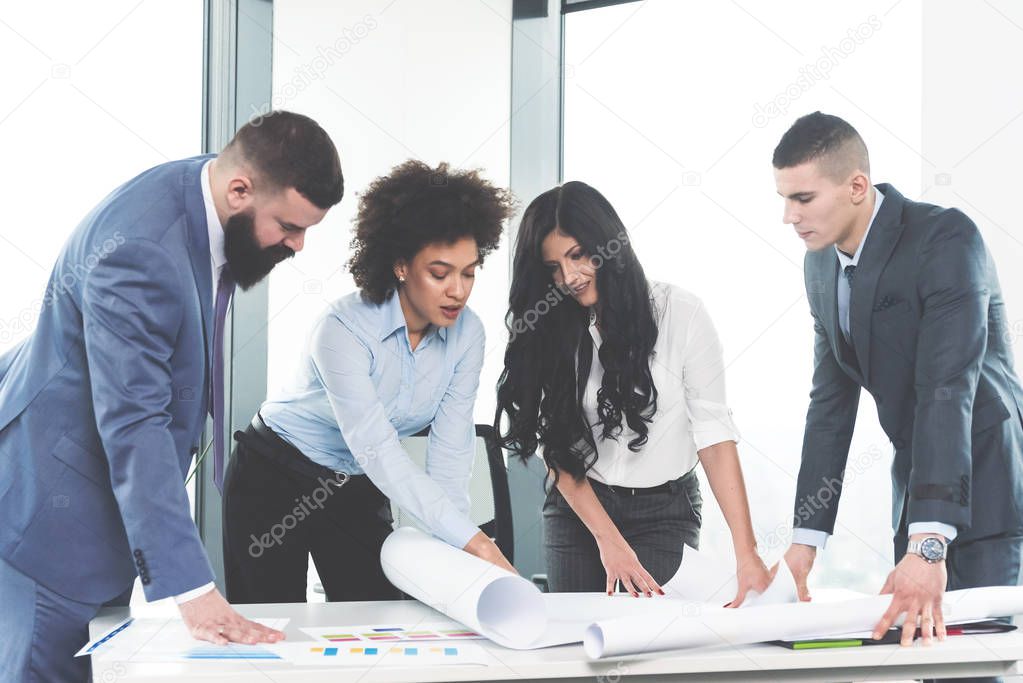 group of business people discussing their new project in firm