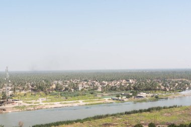 Iraq Babylon - July 12, 2019: View to Euphrates river from former Saddam Hussein palace, Hillah, Babyl, Iraq clipart