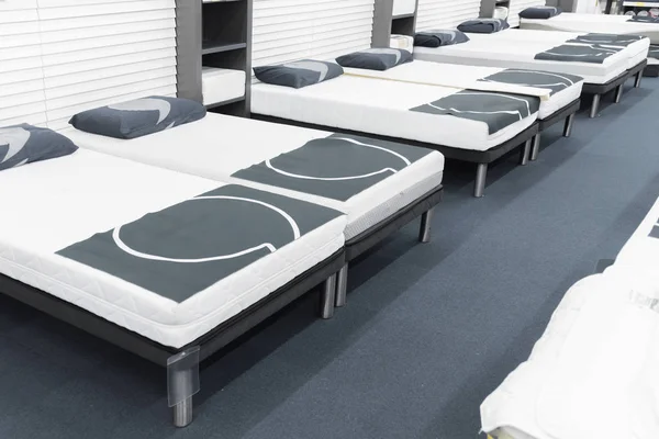 Memory foam mattress. Space for text. Comfortable beds.