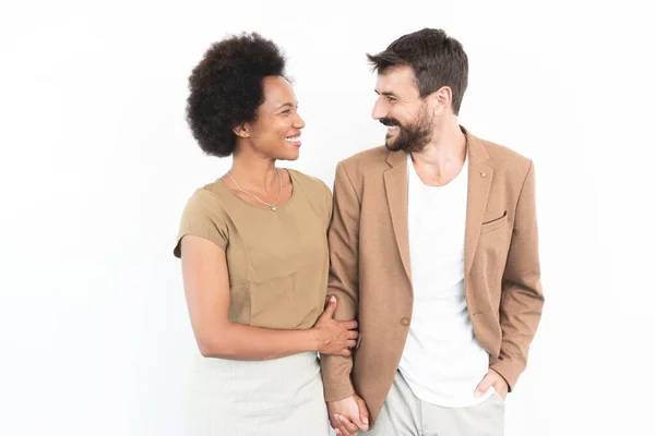 stock image Couple holding hands and looking at each other