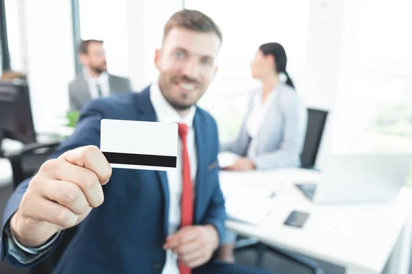 Businessman Showing Credit Card Bank —  Fotos de Stock