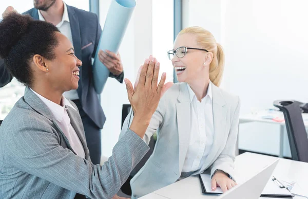 Two Multi Ethnic Businesswomen Doing High Five Office — Fotografia de Stock