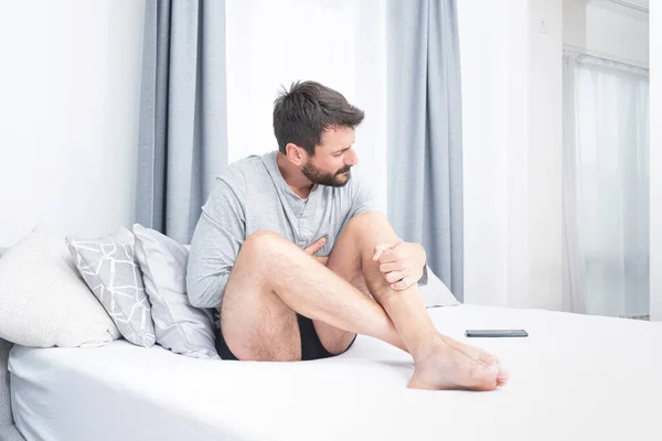 Young Man Pain While Holding His Stomach Bed Home — Stock Photo, Image