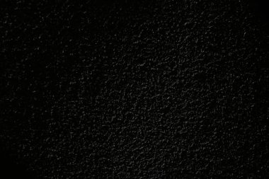 Karanlık beton sıva duvar. Sorunsuz arka plan doku. Çok düşük ışık resmedilmiştir. Yakın çekim görünümü.