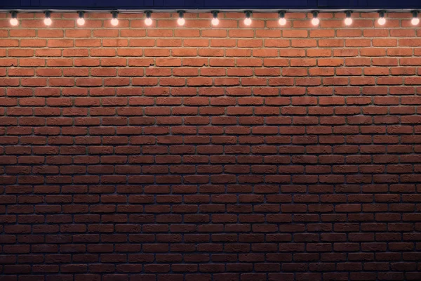 Orange Brick Wall Small Light Bulbs Gradient Stone Background Low — Stock Photo, Image