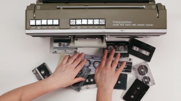 Woman Hands Picks Audio Cassette Tape Table Place Retro Player — Stock Video