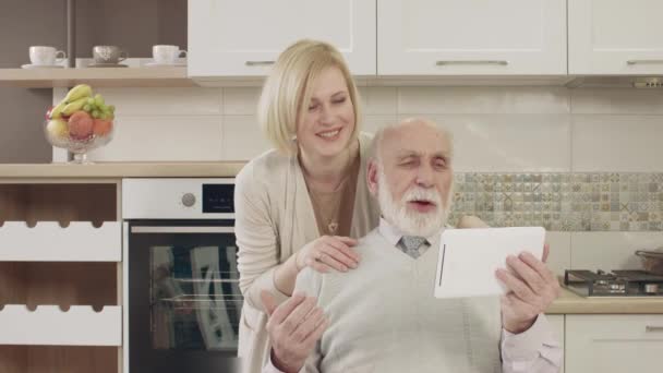 Household Uses A Tablet For Video Communication During A Family Dinner — Stock Video