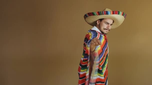 Young Mexican In Multicolored Poncho And Hat. — Stock Video
