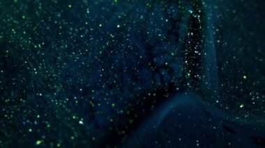 Mavi ve Sarı Kristaller Mavi Arkaplanda Parlıyor. Sıvı Sanat.