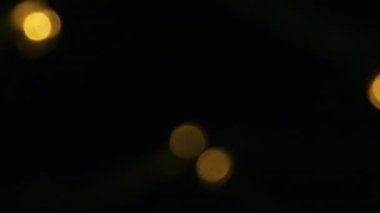 Soyutlama. Bulanık Yuvarlak Işıklar Sarı Noeldir. Dekor