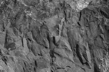 Siyah ve gri mermer desenli. Beyaz serpinti. İç dizaynda kullanılabilir. Çok pahalı görünüyor..