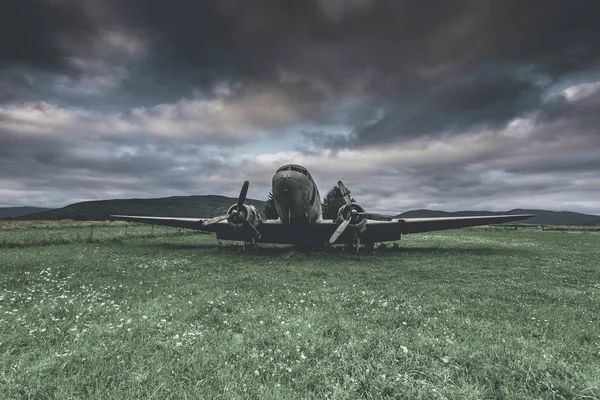 abandoned war plane in a field