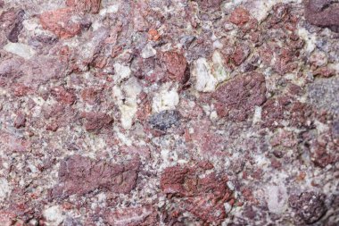 Mor ve beyaz renkli kaya yüzeyi dokusu ve arkaplan